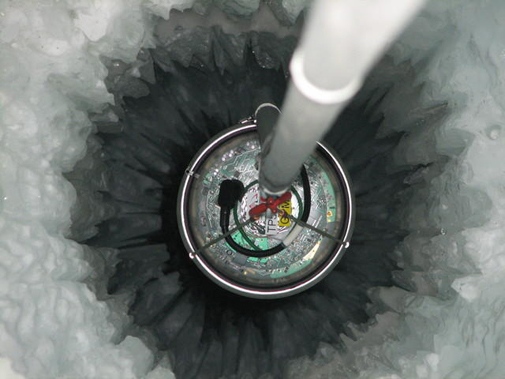 Inside an IceCube string Credit: IceCube/NSF  The deployment of each of the 86 IceCube strings lasted about 11 hours. In each one, 60 sensors (called DOMs) had to be quickly installed before the ice completely froze around them.