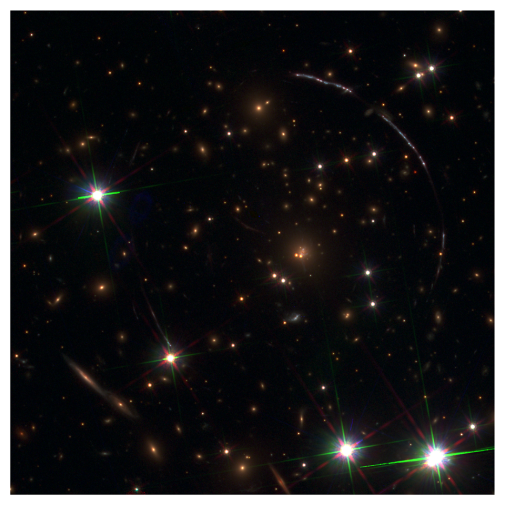 Image of the Sunburst arc and its lensing foreground galaxy cluster in UV and optical light.