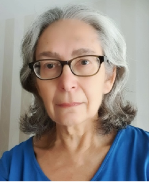 Picture of Olga Botner in a blue shirt with glasses.